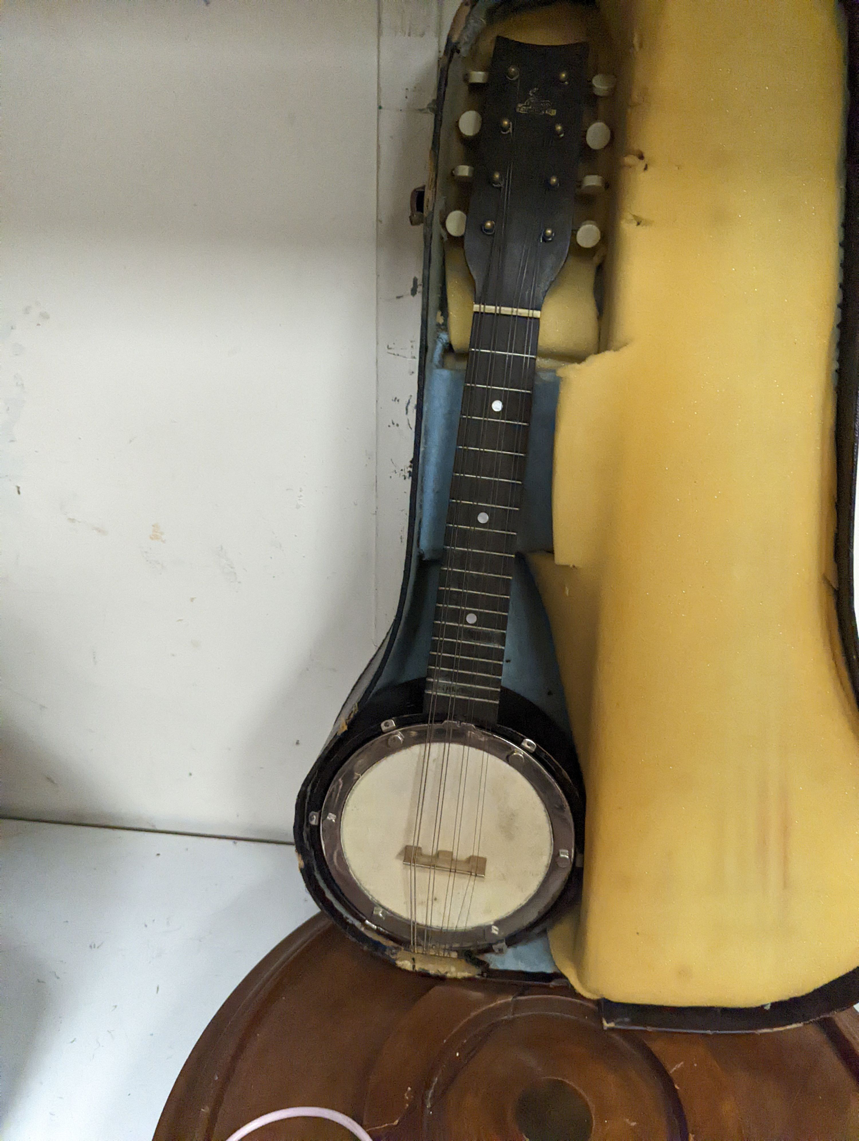 A cased miniature banjo, gilt metal mounted telephone and a mahogany lazy susan (a.f.)
